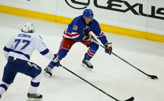 New York Rangers J.T. Miller skates past Tampa Bay