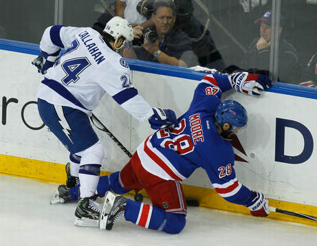 Tampa Bay Lightning Ryan Callaghan (L) checks New York