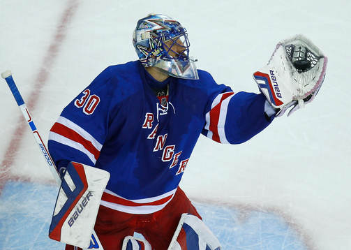 New York Rangers goalie Henrik Lundqvist makes a glove save