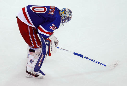 New York Rangers goalie Henrik Lundqvist skates around the