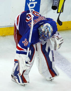 New York Rangers goalie Henrik Lundqvist slams his stick
