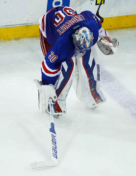 New York Rangers goalie Henrik Lundqvist slams his stick