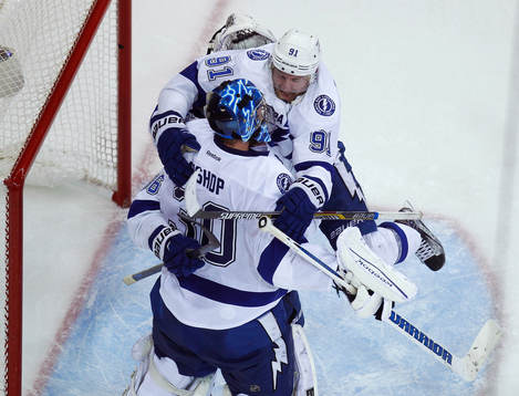 Tampa Bay Lightning Steven Stamkos (R) jumps