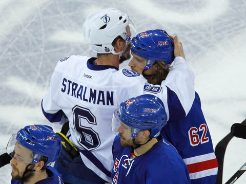 Tampa Bay Lighting Anton Stralman (L) consoles New York