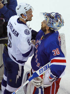 Tampa Bay Lighting Anton Stralman (L) shakes hands with New