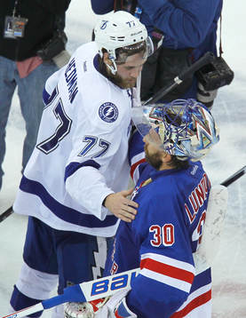 Tampa Bay Lighting Victor Hedman (L) shakes hands with New