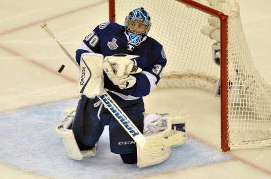 The Lightning's Ben Bishop deflects a shot