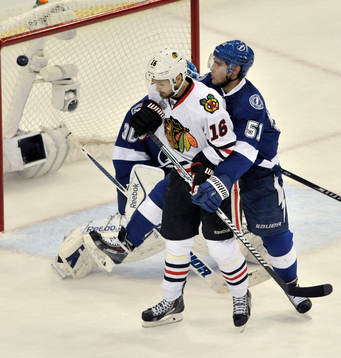 The Lightning's Valterri Flippula (51) wraps up the