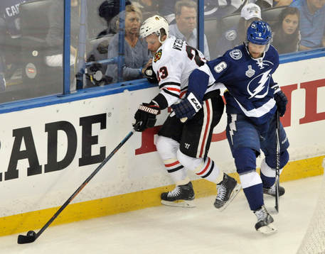 The Lightning's defenseman Anton Strålman (6) checks the