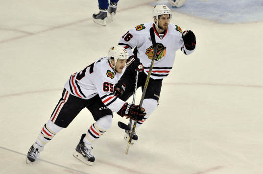 The Blackhawks' Andrew Shaw (65) and Marcus Kruger (16)