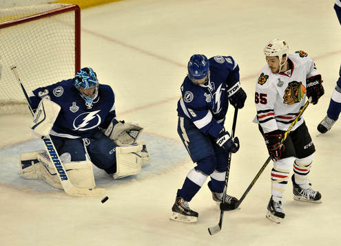 The Lightning's Anton Strålman (6) helps goalie Ben Bishop