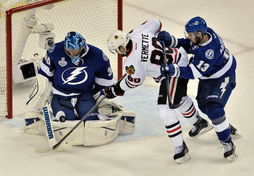 The Lightning's Ben Bishop (30) stops a shot from the