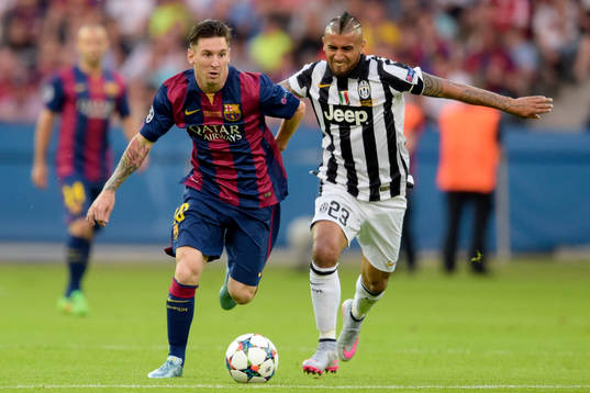 Barcelonas Lionel Messi och Juventus Arturo Vidal