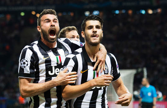Juventus Andrea Barzagli och Alvaro Morata jublar