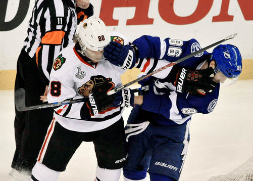 The Blackhawks Patrick Kane (88) and the Lightning's Nikita