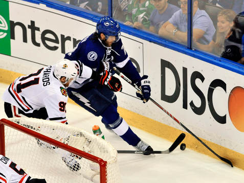The Lightning's Victor Hedman (77) moves the puck