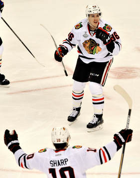 The Blackhawks' Patrick Sharp (10) and Teuvo Teravainen