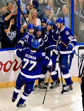 The Lightning's Victor Hedman (77), Andrej Sustr (62),