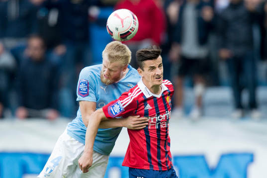 Malmö FFs Filip Helander och Djurgårdens Haris Radetinac