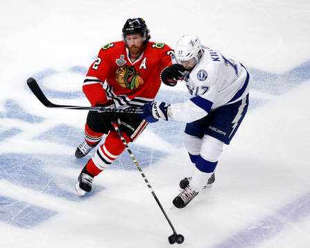 Chicago Blackhawks defenseman Duncan Keith (2) fights for