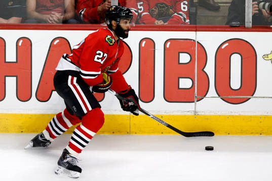Chicago Blackhawks defenseman Johnny Oduya (27) skates with