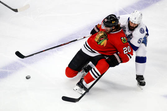 Chicago Blackhawks left wing Brandon Saad (20) collides