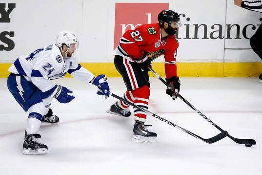 Chicago Blackhawks defenseman Johnny Oduya (27) advances