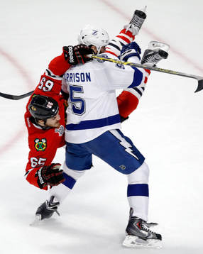 Tampa Bay Lightning defenseman Jason Garrison (5) and