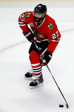 Chicago Blackhawks defenseman Johnny Oduya (27) skates with