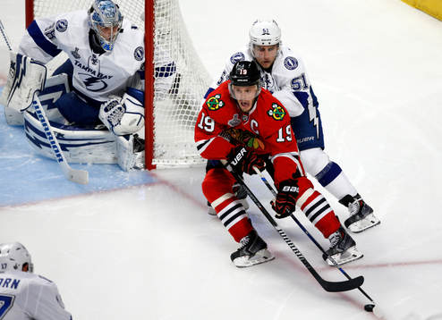 Chicago Blackhawks center Jonathan Toews (19) skates past