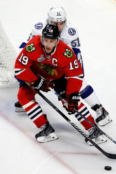 Chicago Blackhawks center Jonathan Toews (19) skates past