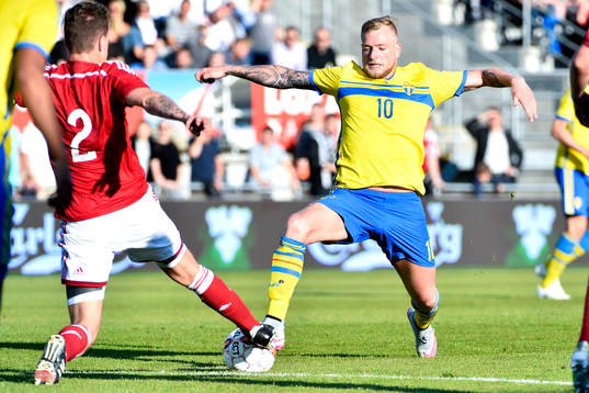 Danmarks Alexander Scholz och Sveriges John Guidetti