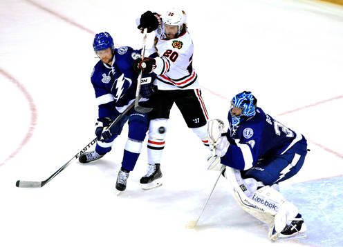 Tampa Bay's Anton Stralman (6) defends Chicago's Brandon