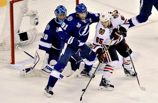 Tampa Bay's Steven Stamkos (91) and goalie Ben Bishop (30)