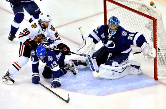 Tampa Bay goalie Ben Bishop (30) and center Cedric Paquette