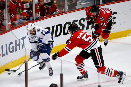 Tampa Bay Lightning right wing J.T. Brown (23) battles