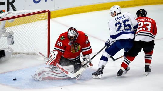 Chicago Blackhawks goalie Corey Crawford (50) and left wing