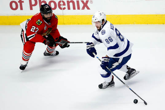 Chicago Blackhawks defenseman Johnny Oduya (27) defends