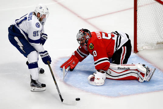 Chicago Blackhawks goalie Corey Crawford (50) defends
