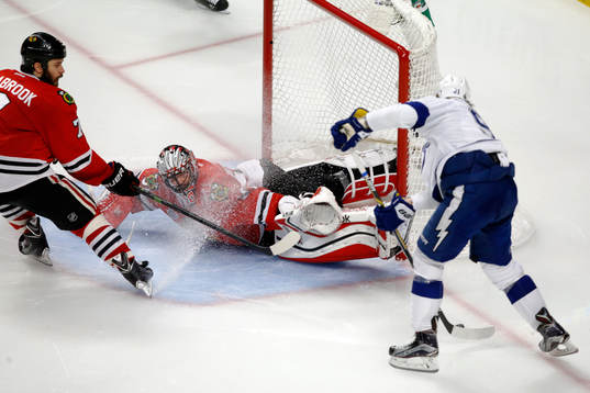 Chicago Blackhawks goalie Corey Crawford (50) defends