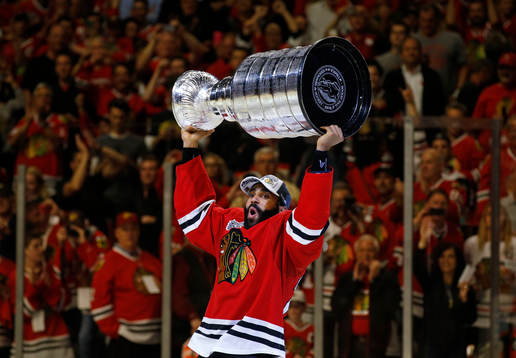 Chicago Blackhawks defenseman Johnny Oduya (27) skates with