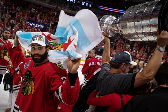 Chicago Blackhawks defenseman Johnny Oduya (27) celebrates