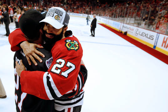 Chicago Blackhawks defenseman Johnny Oduya (27) celebrates