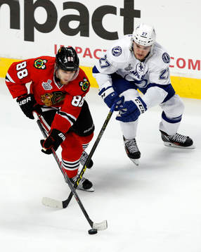 Chicago Blackhawks right wing Patrick Kane (88) skates past