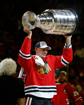 Chicago Blackhawks' Viktor Svedberg skates with the Stanley