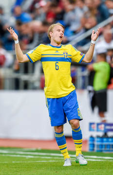 Sveriges Oscar Lewicki reagerar