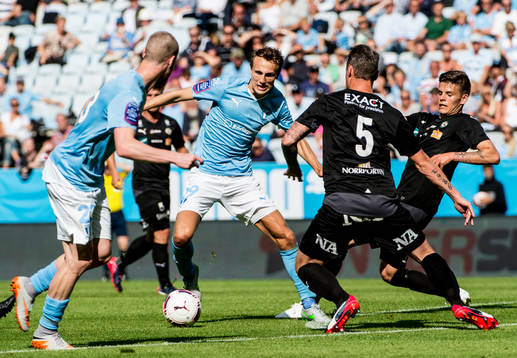 Malmö FFs Magnus Wolff Eikrem och Jo Inge Berget mot Erik