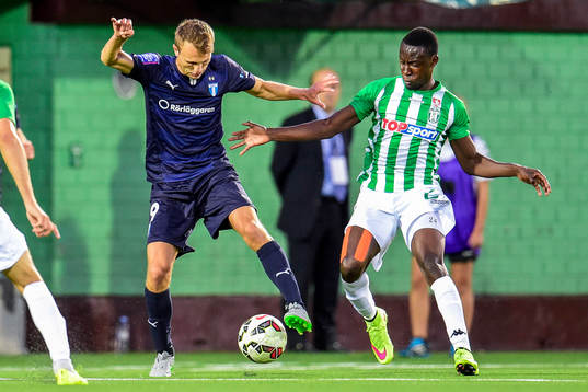 Malmö FFs Magnus Wolff Eikrem och Zalgiris Serge Nyuiadzi