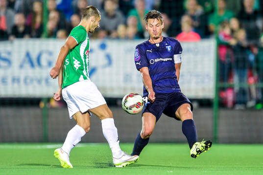 Zalgiris Andro Svrljuga och Malmö FFs Markus Rosenberg