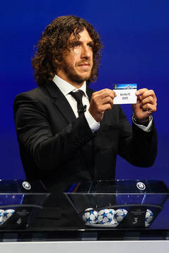 Sevilla dras av Carles Puyol